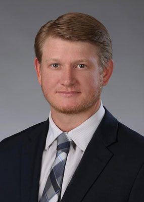 Austin Holzknecht, Associate